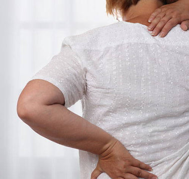 Understanding the Connection Between Back Pain & Body Weight